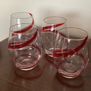 Pier 1 red swirl stemless wine glasses.  Set of 4